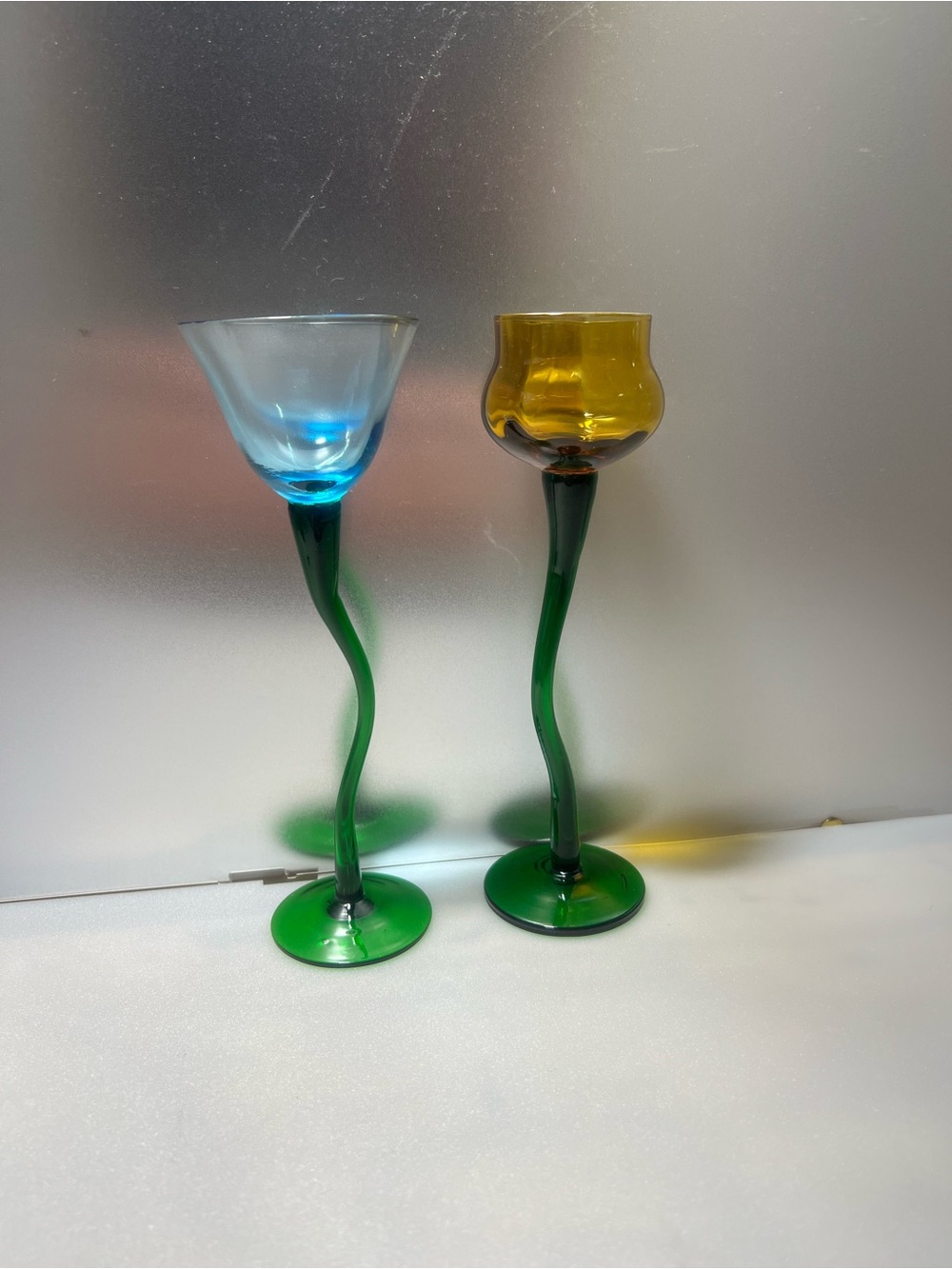 Asymmetrical hand-blown glass Martini glasses
